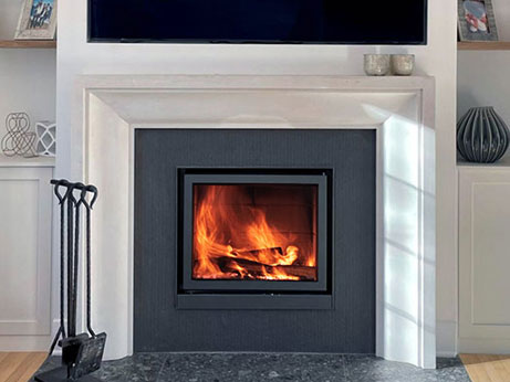 4127.9 Pearl Honed with black granite around STUV fireplace